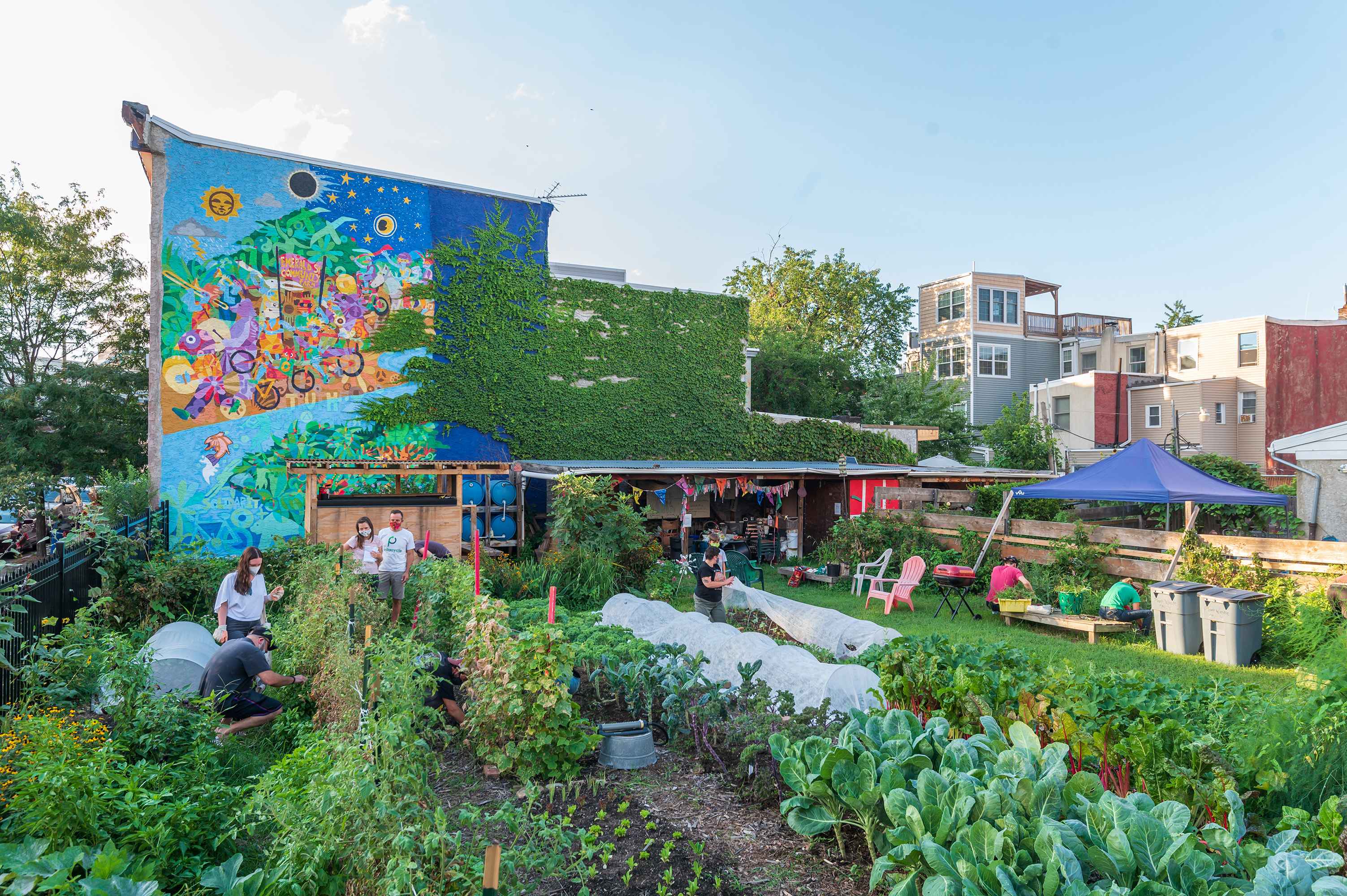 Gardeners working at the Neighborhood Gardens Trust of Philadelphia.