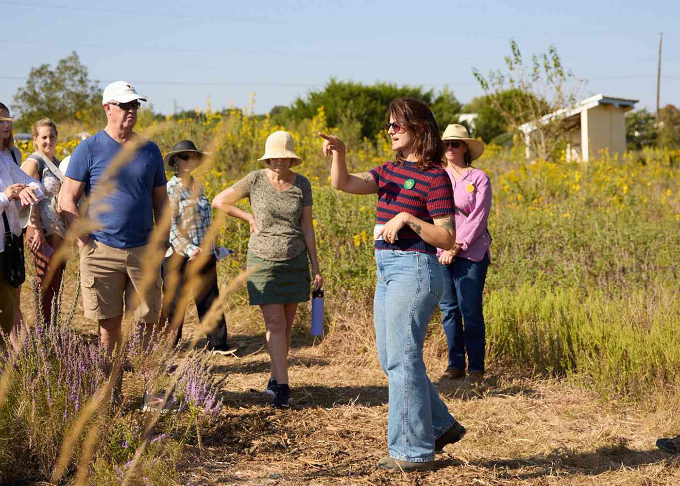 Digging Deeper event participants on a garden tour.